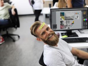 man laughing beard office working people